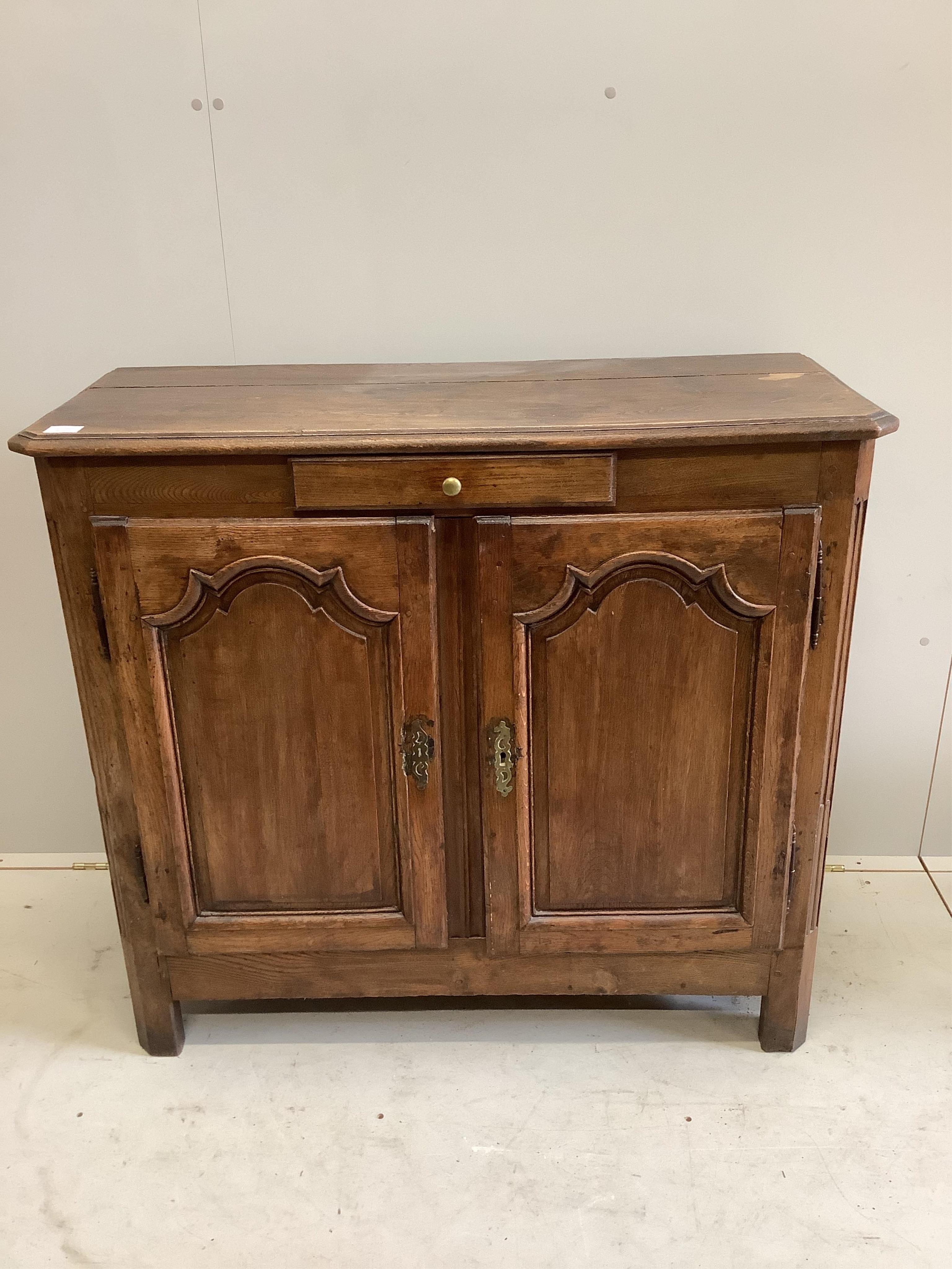 A 19th century French oak cupboard, width 108cm, height 97cm. Condition - a little faded and rubbed, otherwise good